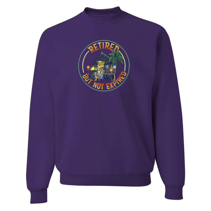Purple sweatshirt with a colorful graphic and text on a white background
