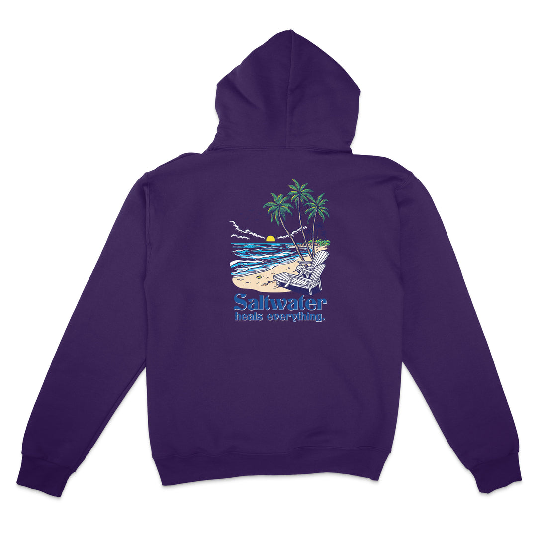Purple hoodie with a beach graphic and 'Saltwater Heals Everything' text on the back, against a white background.