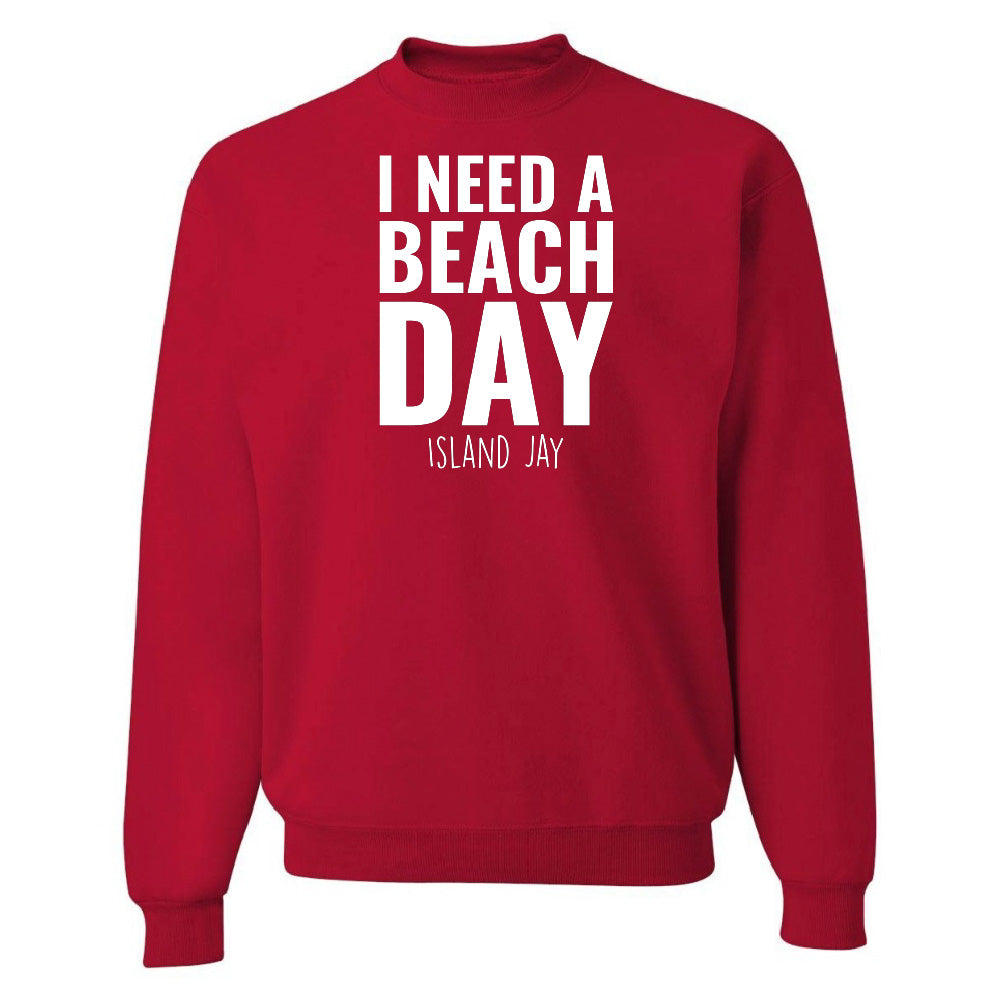 Red sweatshirt with 'I NEED A BEACH DAY' text on a white background