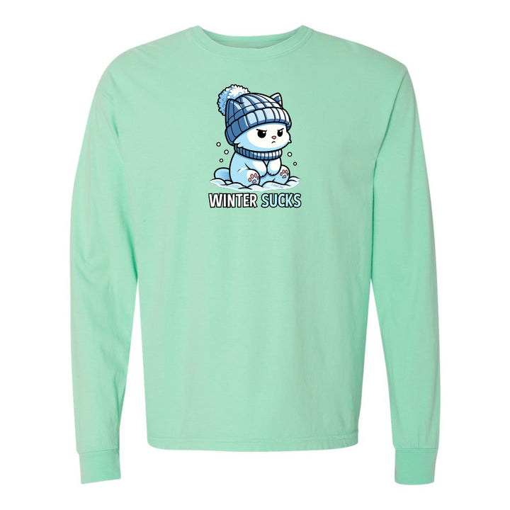Mint green long-sleeve shirt with a cartoon character and 'Winter Sucks' text on a white background