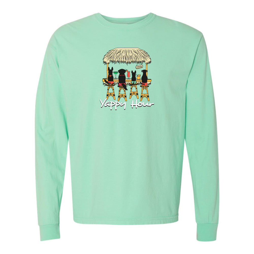 Mint green long-sleeve shirt with a graphic of dogs at a bar and 'Yappy Hour' text on a white background.