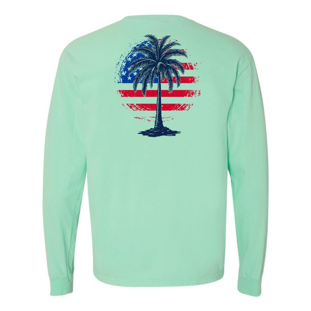 Mint green long-sleeve shirt with a palm tree and American flag design on the back, against a white background.
