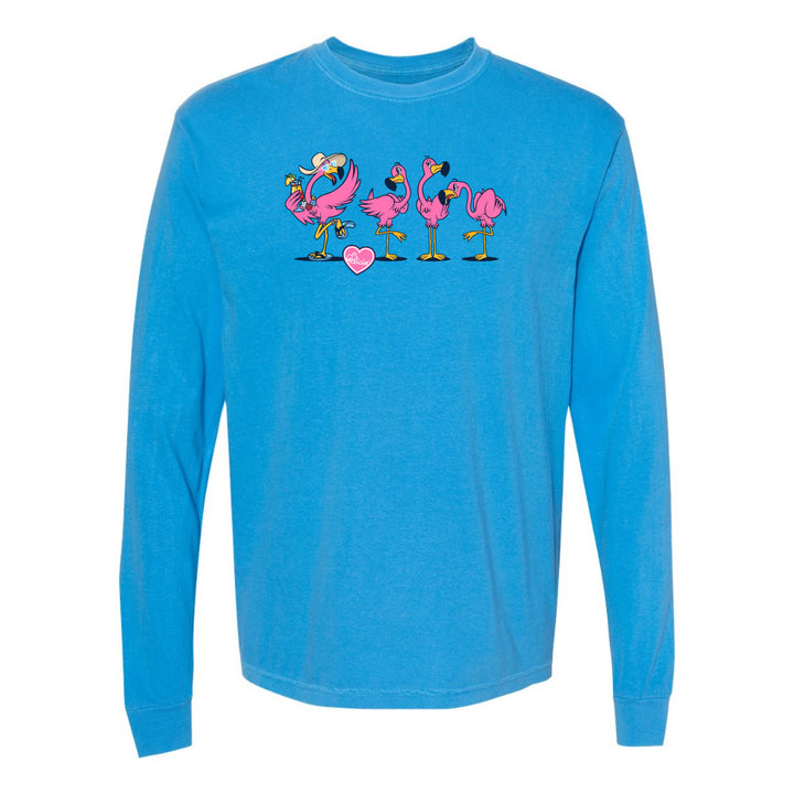 Blue long-sleeve shirt with pink flamingo design on a white background