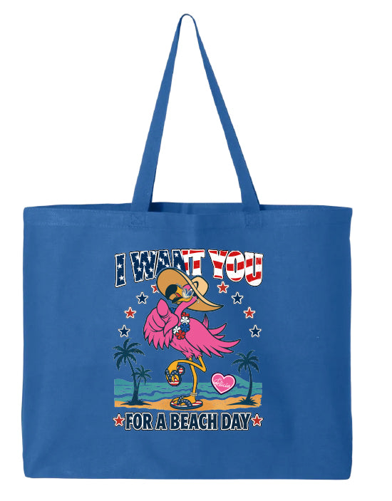 Blue tote bag with a flamingo graphic and text on a white background