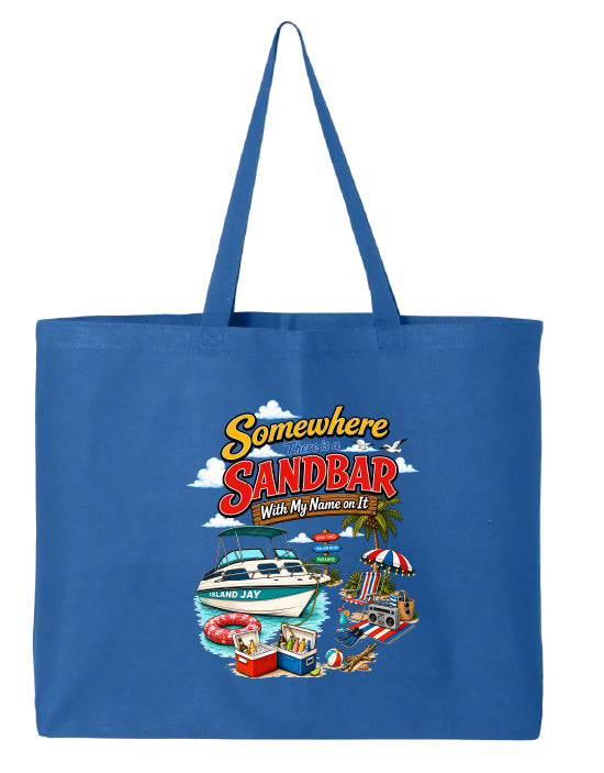 A royal blue canvas tote bag with a colorful graphic print on the front. The graphic features the text 'Somewhere in Sandbar With My Name on It' in yellow and red lettering, accompanied by illustrations of a white speedboat, a beach umbrella, a palm tree, and a beach chair.
