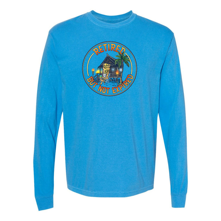 Blue long-sleeve shirt with a graphic design on a white background