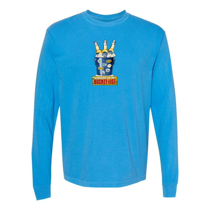 Blue long-sleeve shirt with graphic design on a white background
