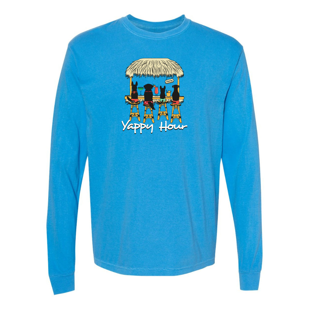 Blue long-sleeve shirt with a graphic of two dogs under a thatched roof and 'Yappy Hour' text on a white background.