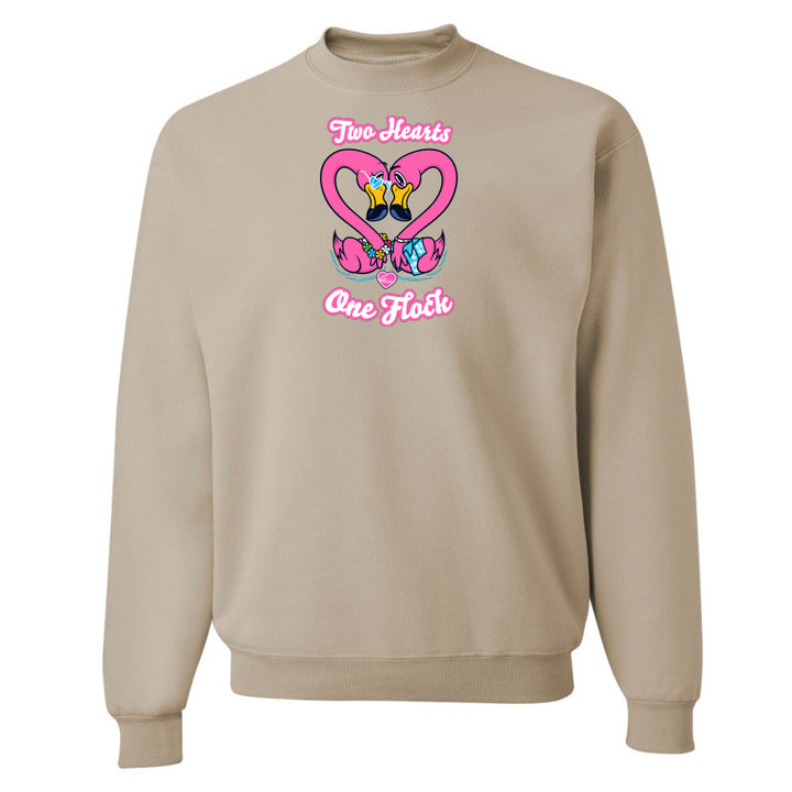 Beige sweatshirt with a colorful graphic design on a white background