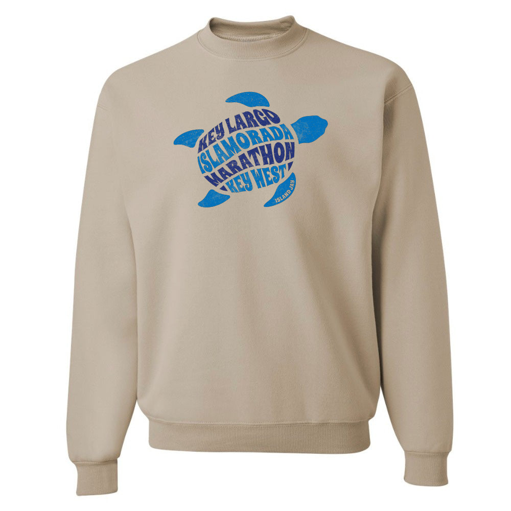 Beige sweatshirt with blue turtle graphic and text on a white background