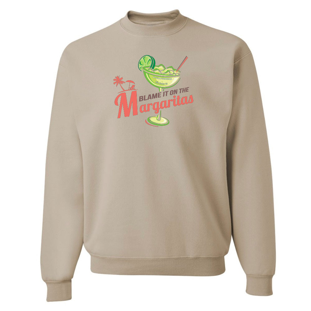 Beige sweatshirt with a graphic design and text on a white background