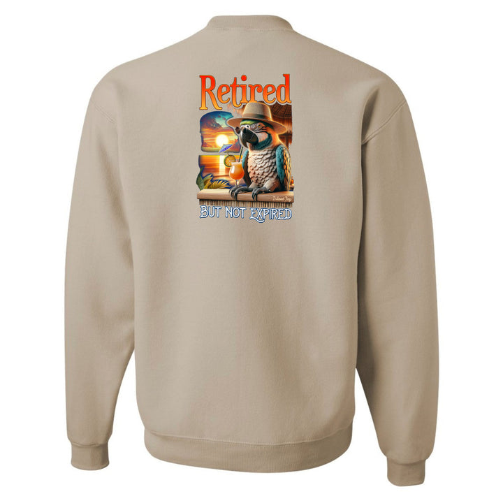 Beige sweatshirt with a parrot graphic and text on the back against a white background