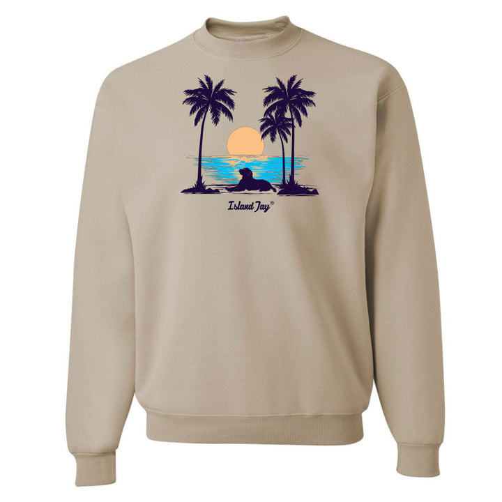 Beige sweatshirt with a graphic of palm trees and a sunset on a white background