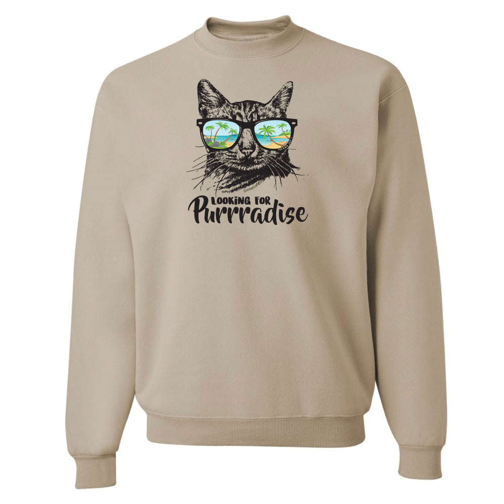 Beige sweatshirt with a cat graphic and 'Looking for Purradise' text on a white background