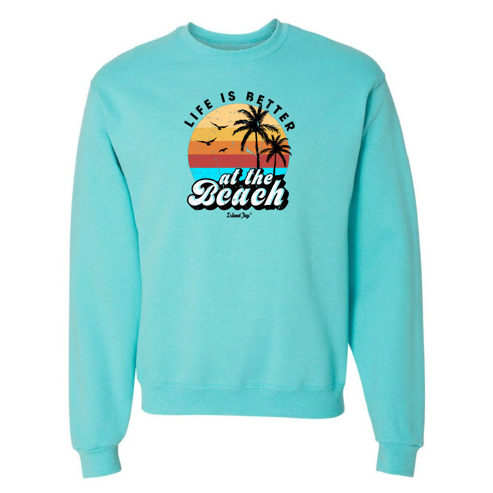 Turquoise sweatshirt with 'Life is Better at the Beach' graphic on a white background