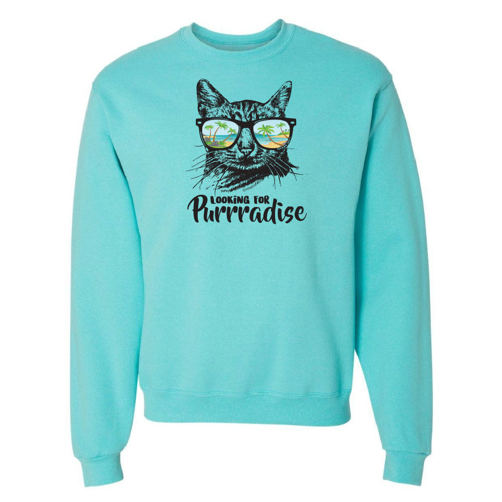 Turquoise sweatshirt with a cat graphic and 'Looking for Purradise' text on a white background