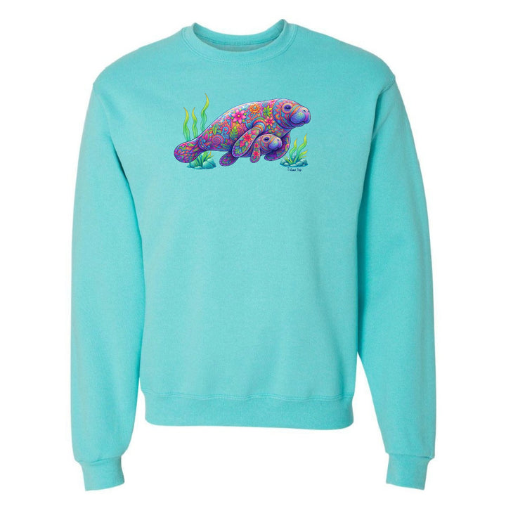 Turquoise sweatshirt with a colorful sea turtle design on a white background