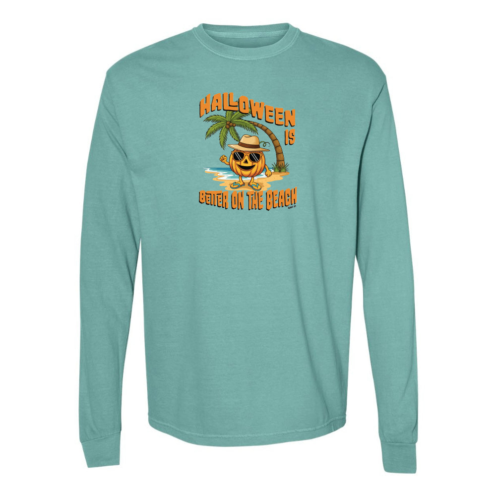 Teal long-sleeve shirt with Halloween design featuring a pumpkin and palm tree on a white background