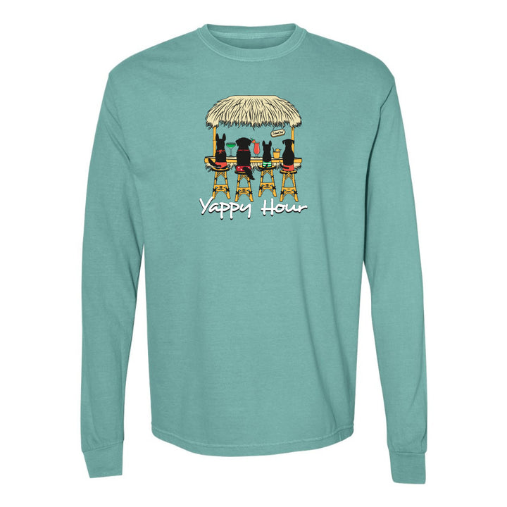 Teal long-sleeve shirt with a graphic of dogs at a bar and 'Yappy Hour' text on a white background