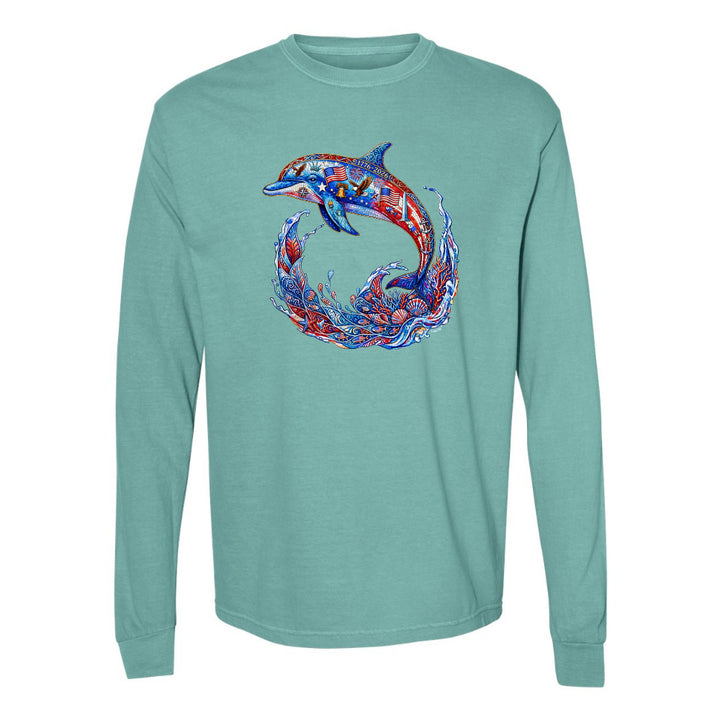 Teal long-sleeve shirt with a colorful dolphin design on a white background
