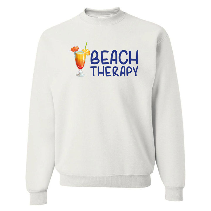 White sweatshirt with 'Beach Therapy' text and cocktail graphic on a white background