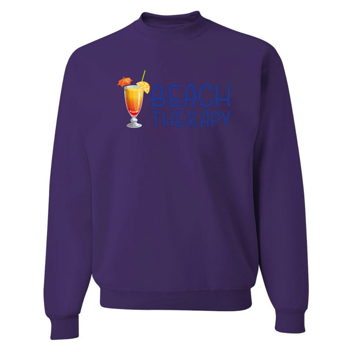 Purple sweatshirt with a cocktail graphic and 'Beach Therapy' text on a white background