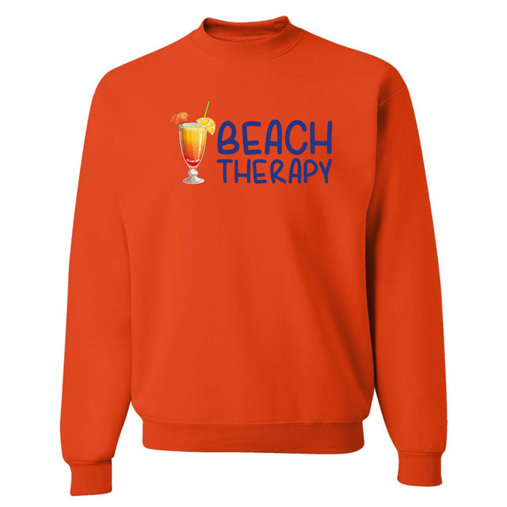 Orange sweatshirt with 'Beach Therapy' text and cocktail graphic on a white background