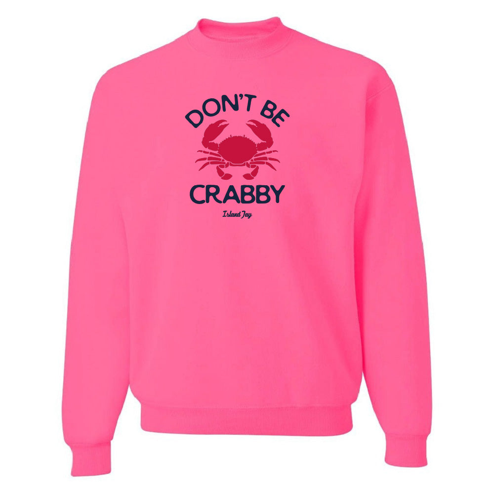 Pink sweatshirt with a crab graphic and text on a white background