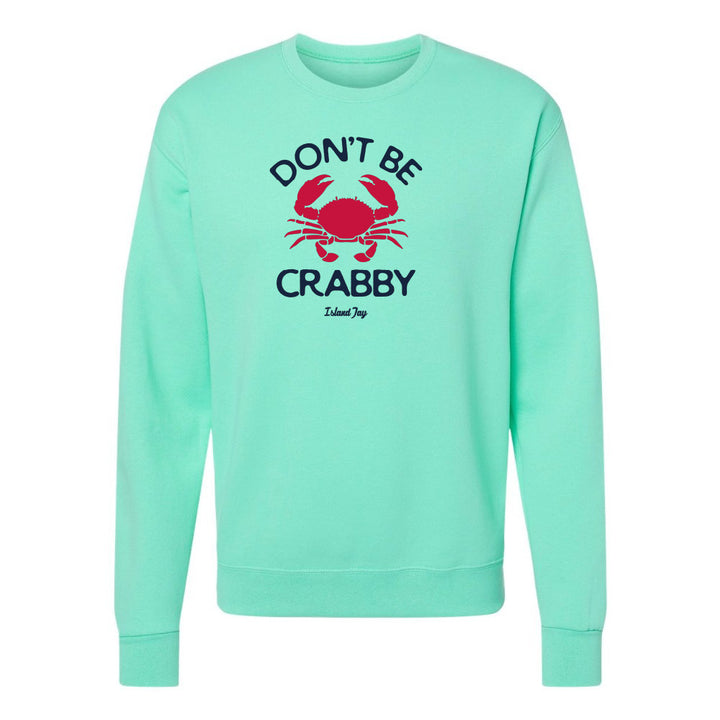 Mint green sweatshirt with red crab graphic and text on a white background