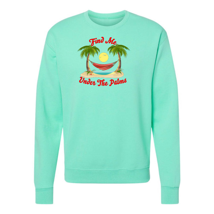 Mint green sweatshirt with tropical graphic and text on a white background
