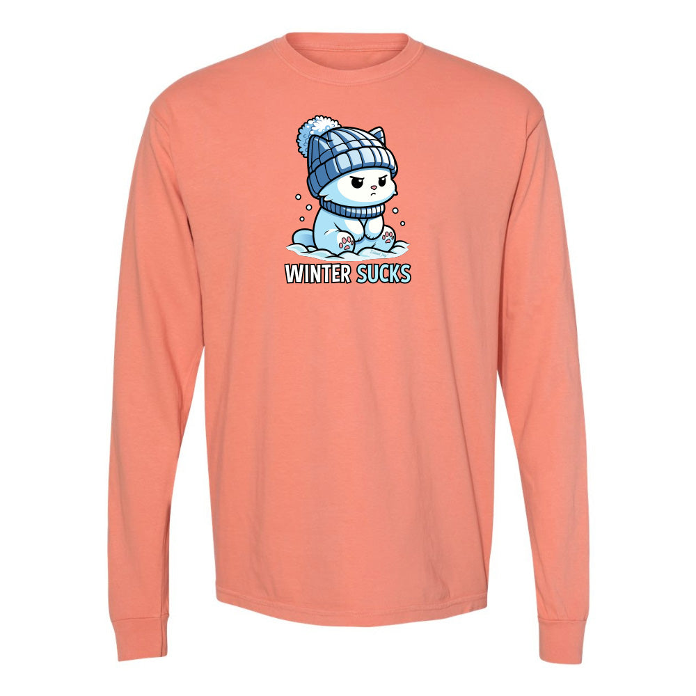 Peach long-sleeve shirt with a graphic of a bear wearing a hat and text 'Winter Sucks' on a white background.