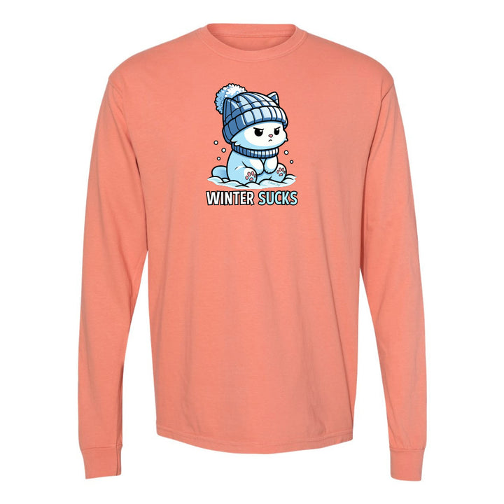 Peach long-sleeve shirt with a graphic of a bear wearing a hat and text 'Winter Sucks' on a white background.
