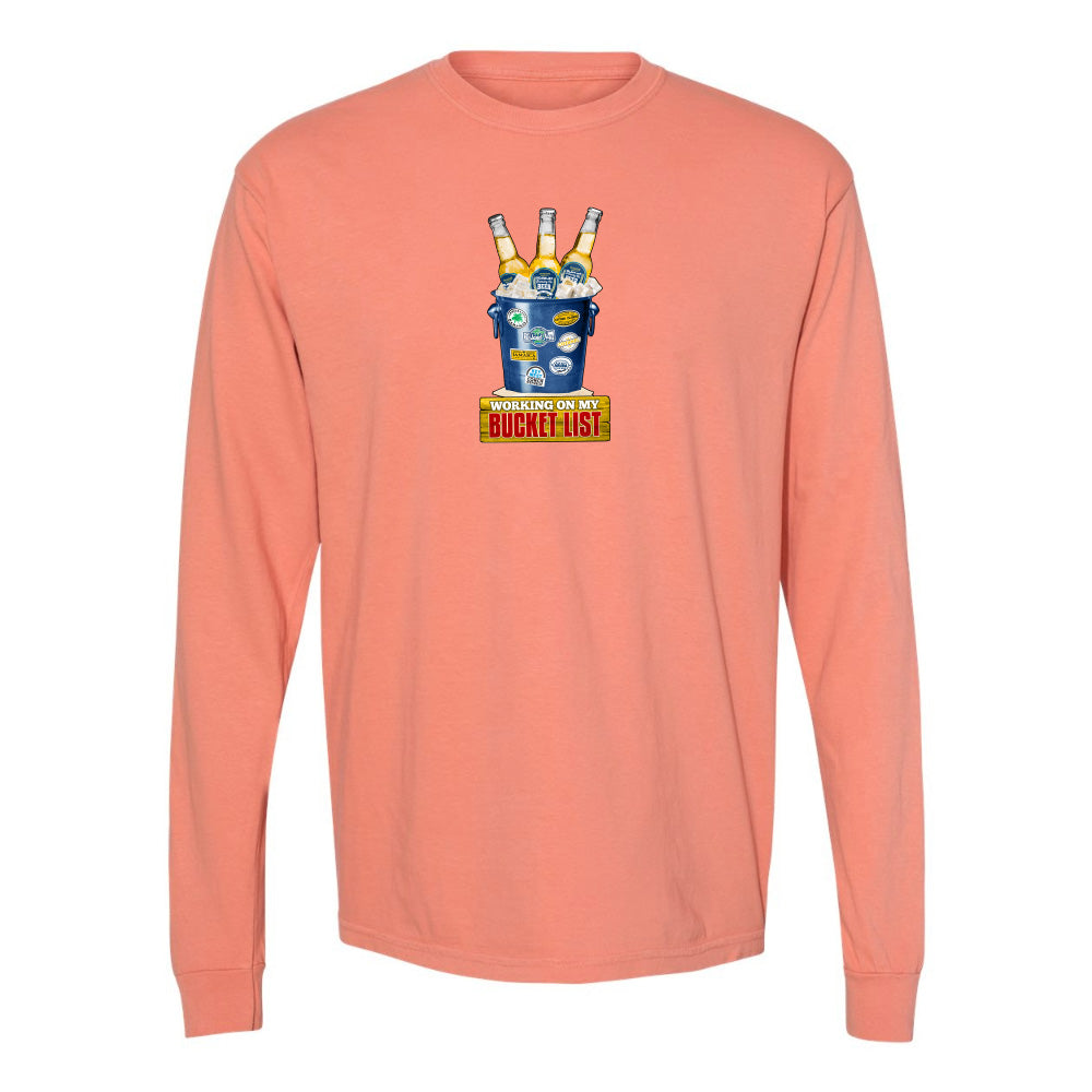 Peach long-sleeve shirt with a graphic design on a white background