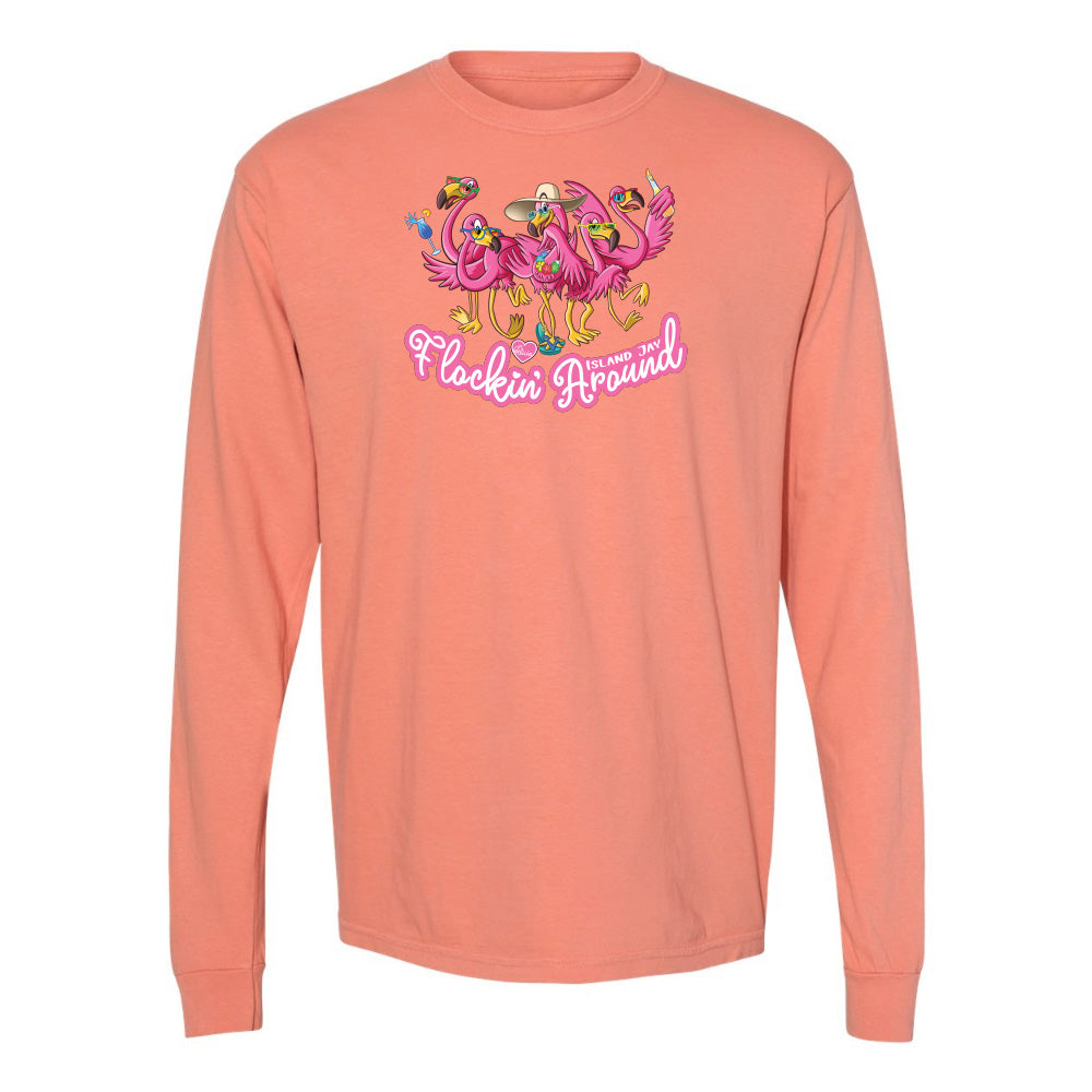 Coral long-sleeve shirt with flamingo design and text on a white background
