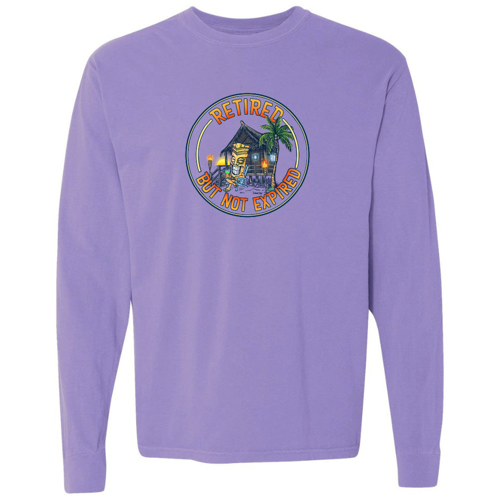 Purple long-sleeve shirt with a tropical house graphic and text on a white background