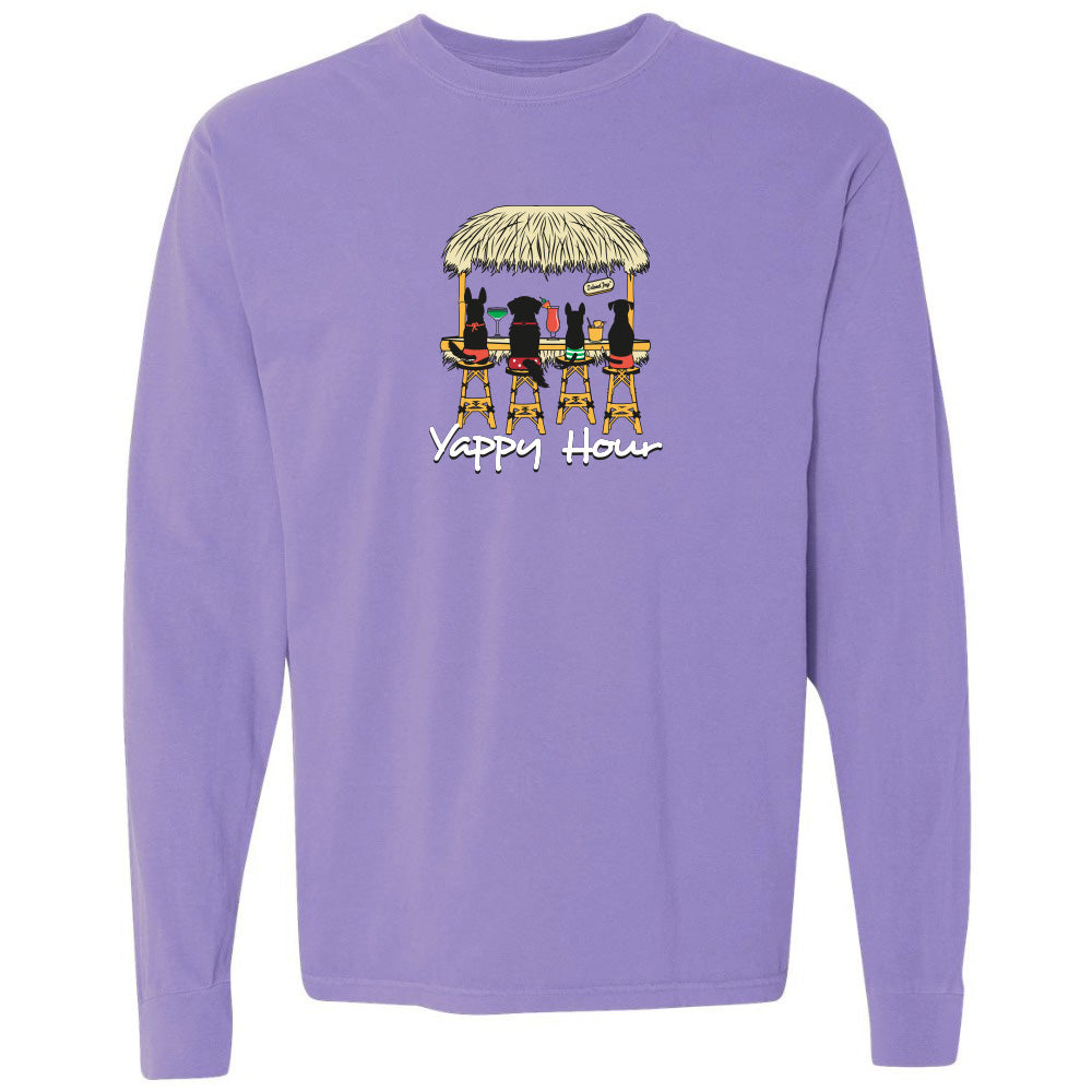 Purple long-sleeve shirt with a graphic of dogs around a thatched-roof table and 'Yappy Hour' text.