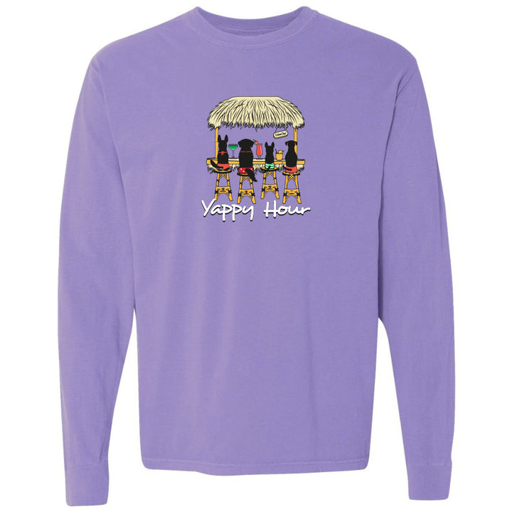Purple long-sleeve shirt with a graphic of dogs around a thatched-roof table and 'Yappy Hour' text.