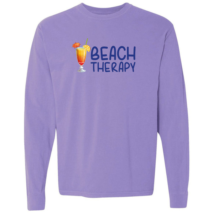 Purple long-sleeve shirt with 'Beach Therapy' text and cocktail graphic on a white background