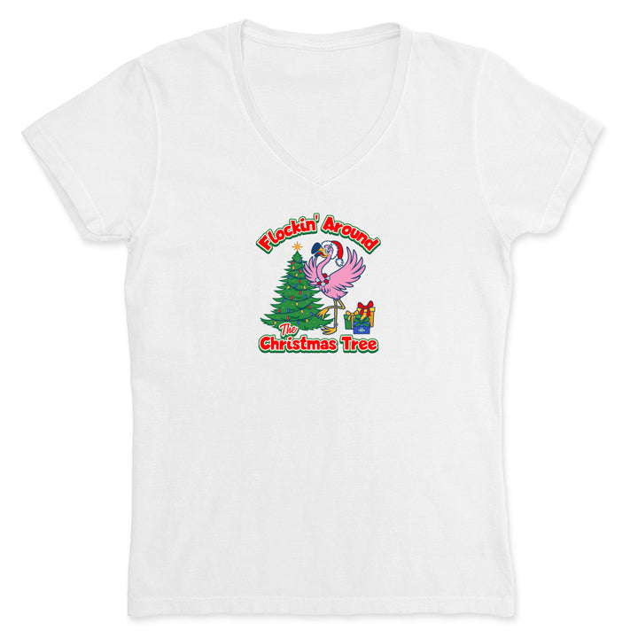 White t-shirt with Christmas-themed design featuring flamingos and a tree on a white background