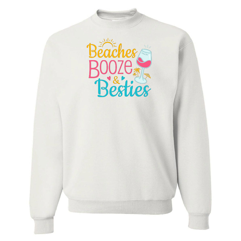 White sweatshirt with 'Beaches Booze & Besties' text and graphics on a white background