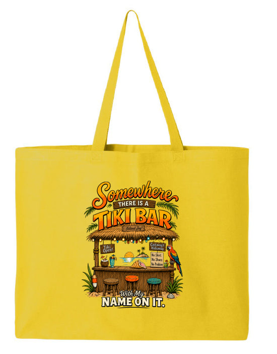 A bright yellow canvas tote bag with two shoulder straps, featuring a colorful graphic print of a tropical tiki bar and the text 'Somewhere there is a TIKI BAR and my name on it.' on a plain white background.